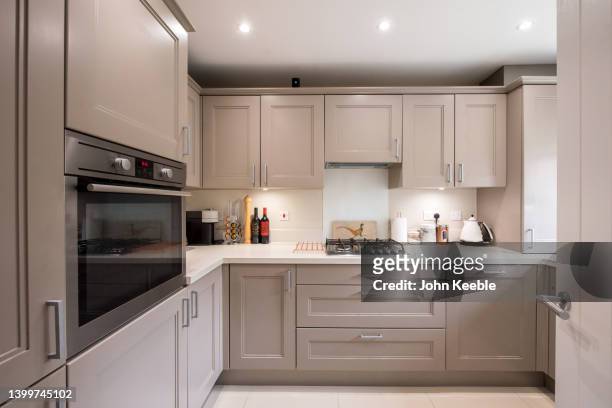 property kitchen interiors - kitchen stock-fotos und bilder