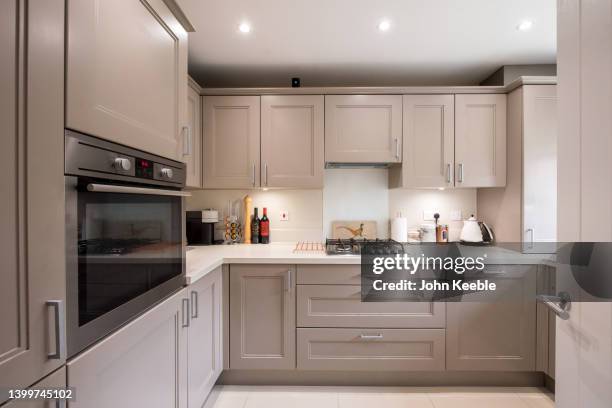 property kitchen interiors - kitchen cupboard stockfoto's en -beelden