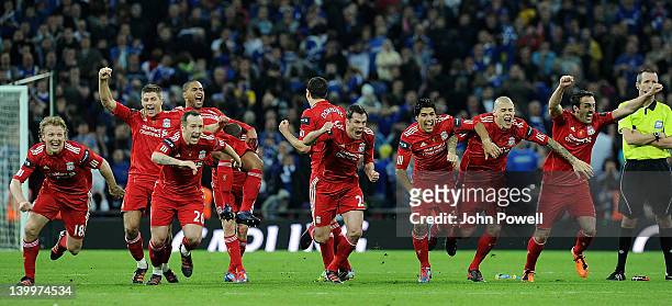 Liverpool team celebrate their win at the end of the Carling Cup Final match between Liverpool and Cardiff City at Wembley Stadium on February 26,...