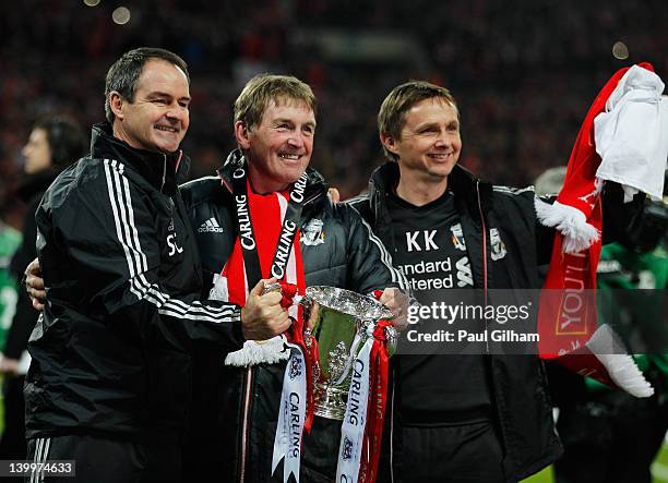 Kenny Dalglish manager of Liverpool celebrates with Steve Clarke and Kevin Keen after victory in the Carling Cup Final match between Liverpool and...