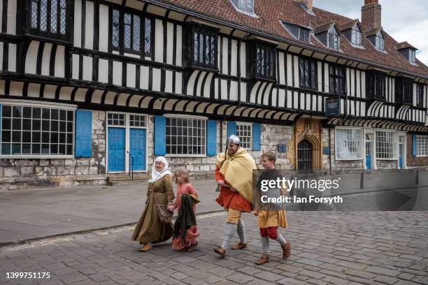 Viking re-enactors march through York during the Yorvik Viking Festival on May 28, 2022 in York, England. The march through the city is part of a...