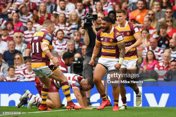 Ricky Leutele of Huddersfield Giants celebrates scoring their side's first try with teammate Josh Jones during the Betfred Challenge Cup Final match...