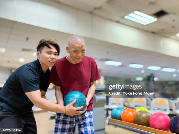 when there is a will, there is a way - bowling alley stock pictures, royalty-free photos & images