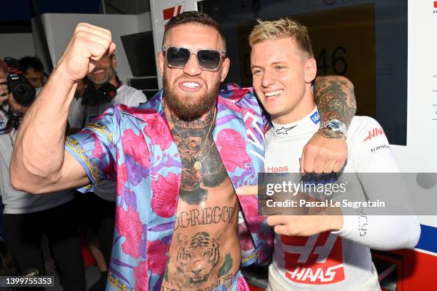 Fighter Conor McGregor and Haas F1 driver Mick Schumacher seen ahead of the F1 Grand Prix of Monaco at Circuit de Monaco on May 28, 2022 in...