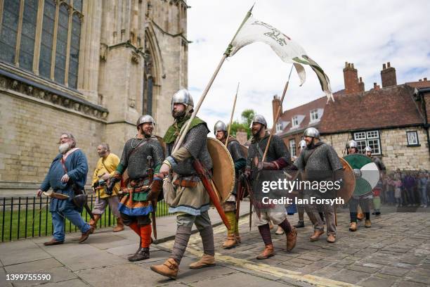 Viking re-enactors march through York during the Yorvik Viking Festival on May 28, 2022 in York, England. The march through the city is part of a...