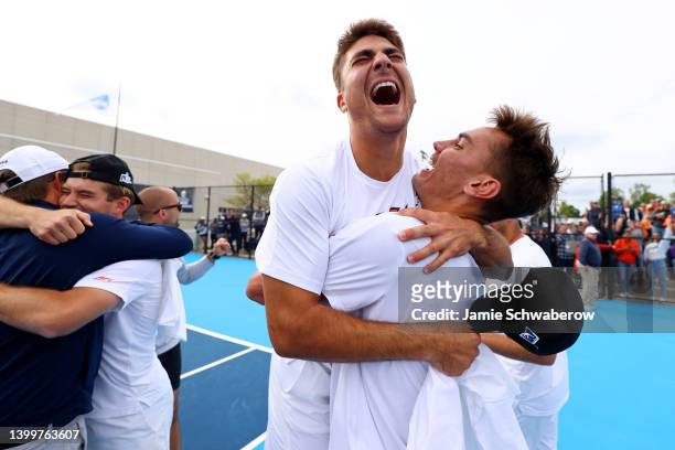 The Virginia Cavaliers celebrate their victory against the Kentucky Wildcats during the Division I Men's Tennis Championship held at the Atkins...