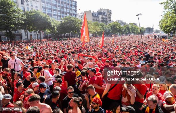 Fans 0f Liverpool FC celebrate at the Liverpool fan zone at Cours de Vincennes ahead of the UEFA Champions League final match between Liverpool FC...