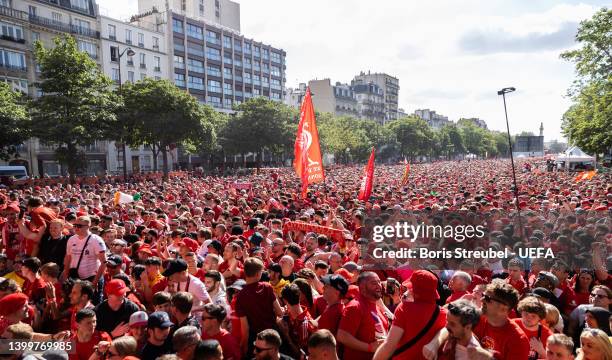 Fans 0f Liverpool FC celebrate at the Liverpool fan zone at Cours de Vincennes ahead of the UEFA Champions League final match between Liverpool FC...