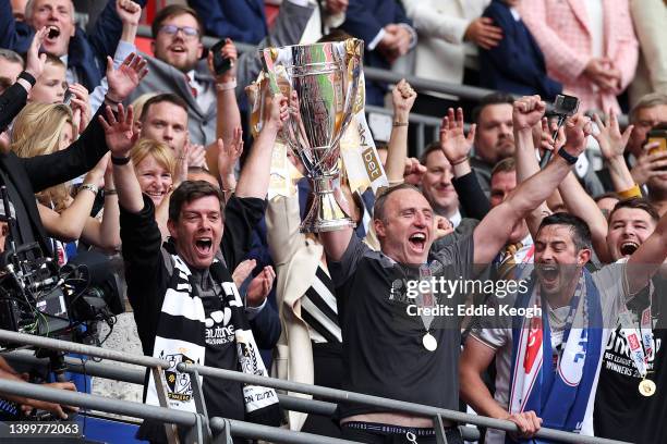 Darrell Clarke, Manager of Port Vale and Andy Crosby, Assistant Manager of Port Vale lift the Sky Bet League Two Play Off Trophy after their sides...