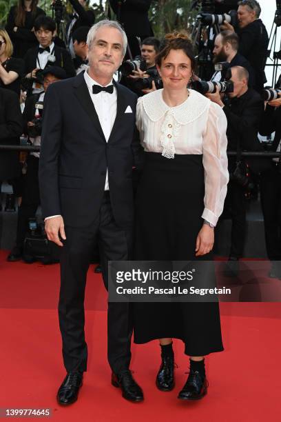 Alfonso Cuarón and Alice Rohrwacher attend the closing ceremony red carpet for the 75th annual Cannes film festival at Palais des Festivals on May...