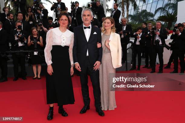 Alice Rohrwacher, Alfonso Cuarón and Alba Rohrwacher attend the closing ceremony red carpet for the 75th annual Cannes film festival at Palais des...