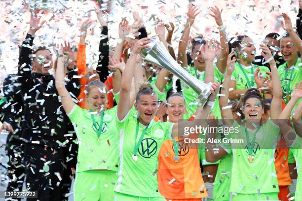 Alexandra Popp of VfL Wolfsburg lifts the DFB-Pokal Frauen trophy after their sides victory during the Women's DFB Cup final match between VfL...