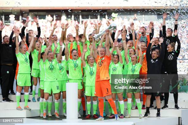 Almuth Schult of VfL Wolfsburg lifts the DFB-Pokal Frauen trophy after their sides victory during the Women's DFB Cup final match between VfL...