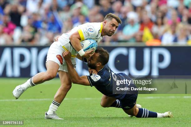 Arthur Retiere of La Rochelle is tackled by Jamison Gibson-Park of Leinster Rugby during the Heineken Champions Cup Final match between Leinster...