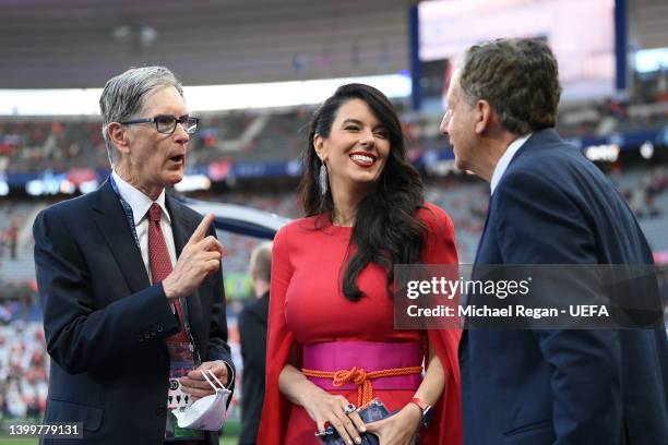 Owners of Liverpool, John W. Henry, wife Linda Pizzuti Henry and Tom Werner interact prior to the UEFA Champions League final match between Liverpool...