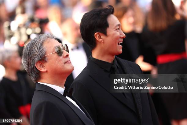 Park Hae-il and Park Chan-wook of "Decision to Leave" attend the closing ceremony red carpet for the 75th annual Cannes film festival at Palais des...