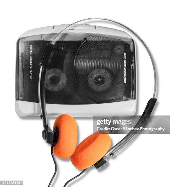 portable cassette music player with headphones on white background - personal stereo stock pictures, royalty-free photos & images