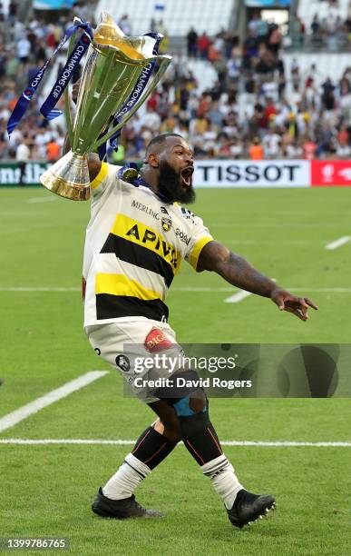 Dany Priso of La Rochelle, celebrates with the Champions Cup after their victory during the Heineken Champions Cup Final match between Leinster Rugby...