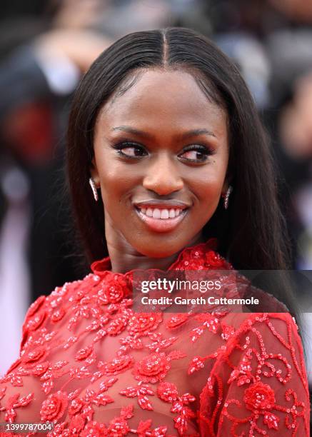 Maimouna Doucoure attends the closing ceremony red carpet for the 75th annual Cannes film festival at Palais des Festivals on May 28, 2022 in Cannes,...
