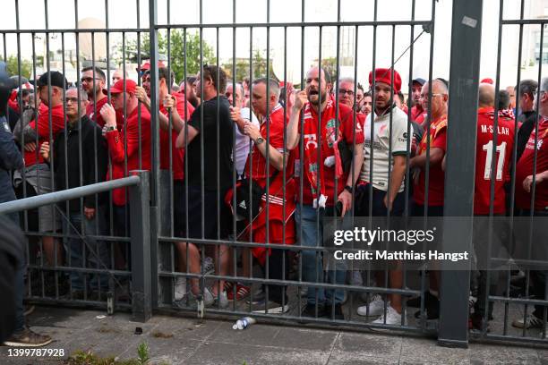 Liverpool fans are seen queuing outside the stadium prior to the UEFA Champions League final match between Liverpool FC and Real Madrid at Stade de...