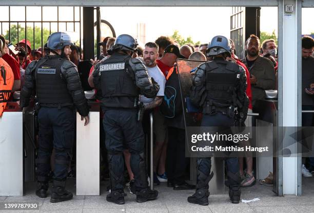 Liverpool fans are seen queuing outside the stadium prior to the UEFA Champions League final match between Liverpool FC and Real Madrid at Stade de...