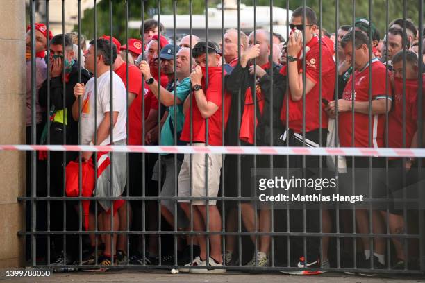 Liverpool fans are seen queuing outside the stadium prior to the UEFA Champions League final match between Liverpool FC and Real Madrid at Stade de...
