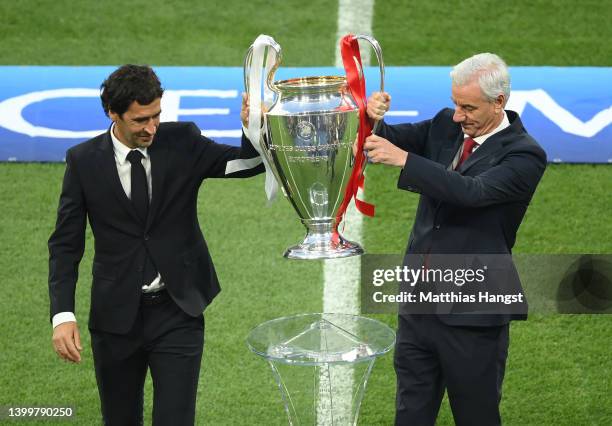 Raul and Ian Rush present the UEFA Champions League trophy prior to the UEFA Champions League final match between Liverpool FC and Real Madrid at...