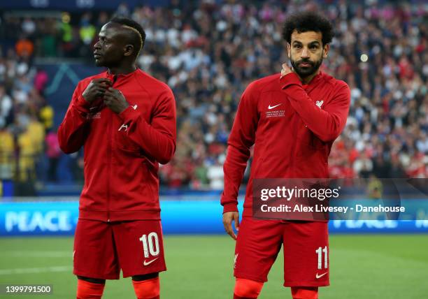 Mohamed Salah and Sadio Mane of Liverpool line up ahead of the UEFA Champions League final match between Liverpool FC and Real Madrid at Stade de...