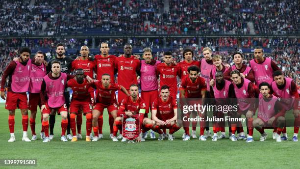 Liverpool players pose for a team photo prior to the UEFA Champions League final match between Liverpool FC and Real Madrid at Stade de France on May...