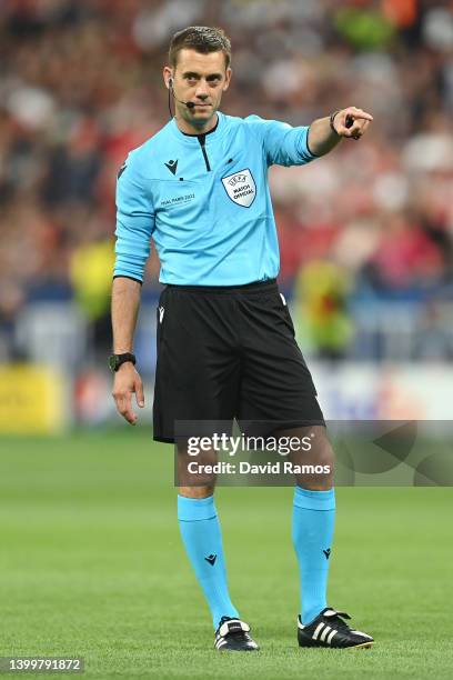 Referee Clement Turpin looks on during the UEFA Champions League final match between Liverpool FC and Real Madrid at Stade de France on May 28, 2022...