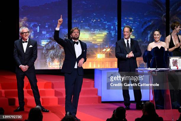 Ruben Ostlund is awarded The Palme d’or for "TRIANGLE OF SADNESS" by President of the Jury of the 75th Cannes Film Festival Vincent Lindon, Alfonso...