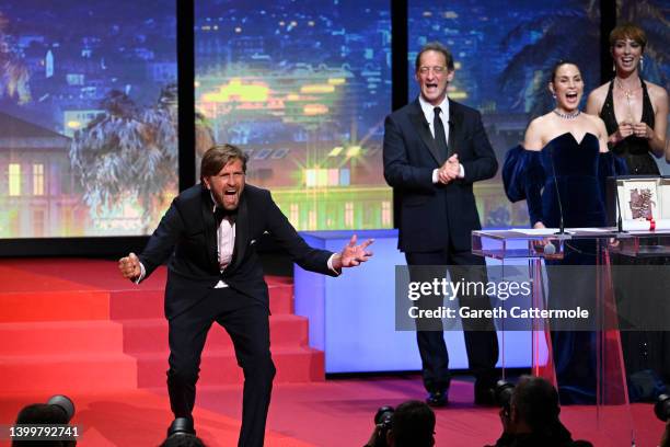 Ruben Ostlund is awarded The Palme d’or for "TRIANGLE OF SADNESS" by President of the Jury of the 75th Cannes Film Festival Vincent Lindon, Alfonso...