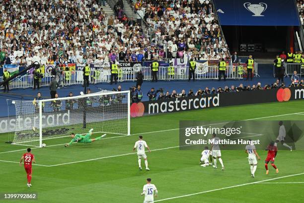 Sadio Mane of Liverpool has a shot saved by Thibaut Courtois of Real Madrid during the UEFA Champions League final match between Liverpool FC and...