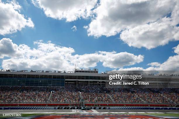 Josh Berry, driver of the Harrison's USA Chevrolet, drives during the NASCAR Xfinity Series Alsco Uniforms 300 at Charlotte Motor Speedway on May 28,...