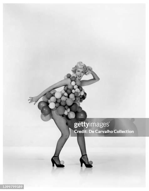 Actress Marilyn Maxwell wears an unusual costume as 'Sheila ‘The Atom’ Dancer' in a publicity shot from the movie 'Key to the City’' 1950, United...