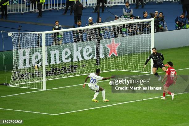 Vinicius Junior of Real Madrid scores their team's first goal during the UEFA Champions League final match between Liverpool FC and Real Madrid at...