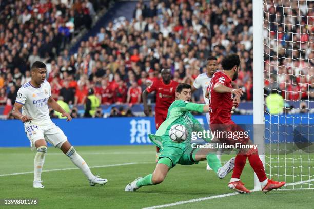 Mohamed Salah of Liverpool has a chance saved by Thibaut Courtois of Real Madrid during the UEFA Champions League final match between Liverpool FC...