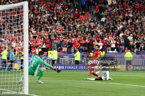 Mohamed Salah of Liverpool has a shot saved by Thibaut Courtois of Real Madrid during the UEFA Champions League final match between Liverpool FC and...