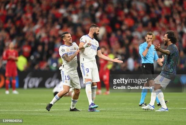 Dani Ceballos, Karim Benzema and Marcelo of Real Madrid celebrate after their sides victory during the UEFA Champions League final match between...
