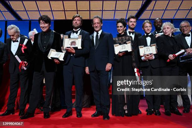 Jury President Vincent Lindon poses with awarded Jerzy Skolimowski, Song Kang-Ho, Ruben Ostlund, Zar Amir-Ebrahimi, Lukas Dhont, Eden Dambrine, jury...