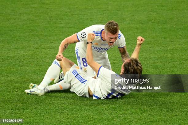 Toni Kroos and Luka Modric of Real Madrid celebrate after their sides victory during the UEFA Champions League final match between Liverpool FC and...