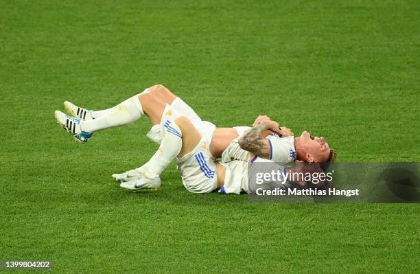 Toni Kroos and Luka Modric of Real Madrid celebrate after their sides victory during the UEFA Champions League final match between Liverpool FC and...