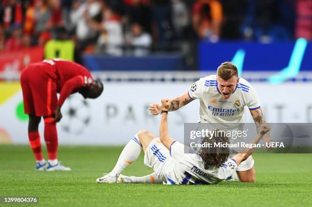 Luka Modric celebrates with Toni Kroos of Real Madrid after the final whistle is blown to confirm their side as winners of the UEFA Champions League...