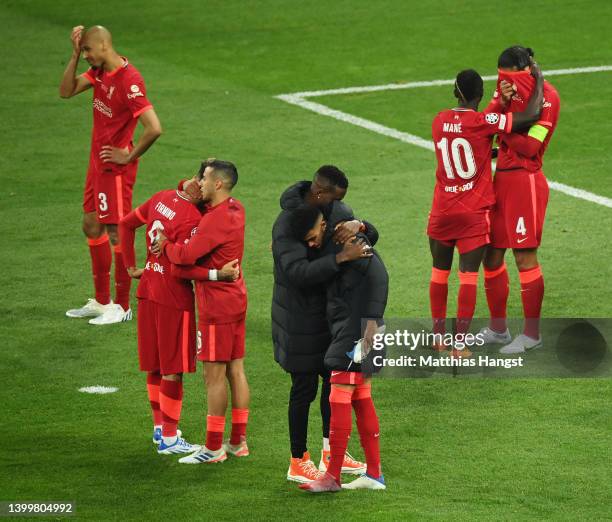 Sadio Mane and Virgil van Dijk of Liverpool look dejected following their sides defeat in the UEFA Champions League final match between Liverpool FC...