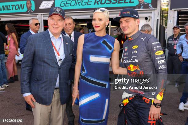 Prince Albert II of Monaco, Princess Charlene of Monaco and Max Verstappen attend qualifying ahead of the F1 Grand Prix of Monaco at Circuit de...