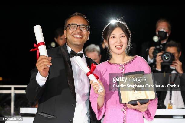 Film Writer Abinash Bikram Shah poses with the Special mention Short Film Palme d'Or Award for 'Lori' and Jianying Chen poses with the Best Short...