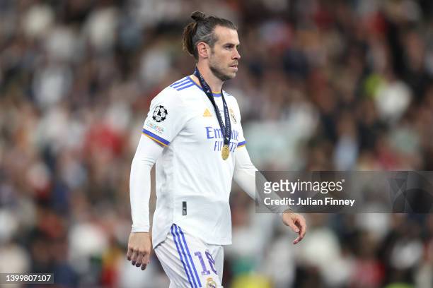 Gareth Bale of Real Madrid looks on after collecting their winners medal after victory in the UEFA Champions League final match between Liverpool FC...