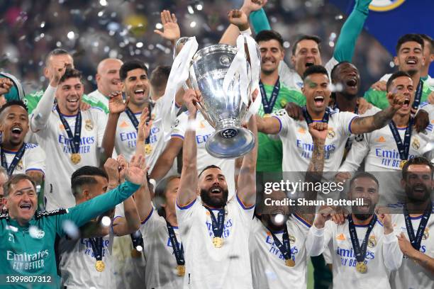 Karim Benzema of Real Madrid lifts the UEFA Champions League trophy after their sides victory during the UEFA Champions League final match between...