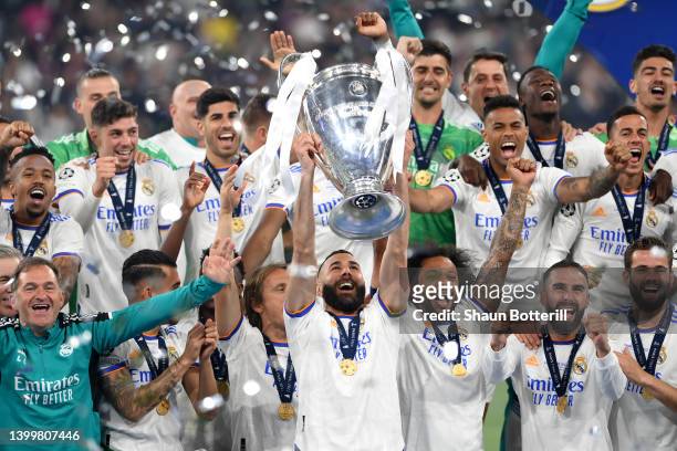Karim Benzema of Real Madrid lifts the UEFA Champions League trophy after their sides victory during the UEFA Champions League final match between...