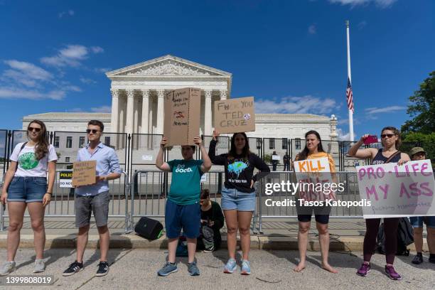 Protesters gather at the Supreme Court to demand an end to gun violence and call for abortion rights protection on May 28, 2022 in Washington, DC....